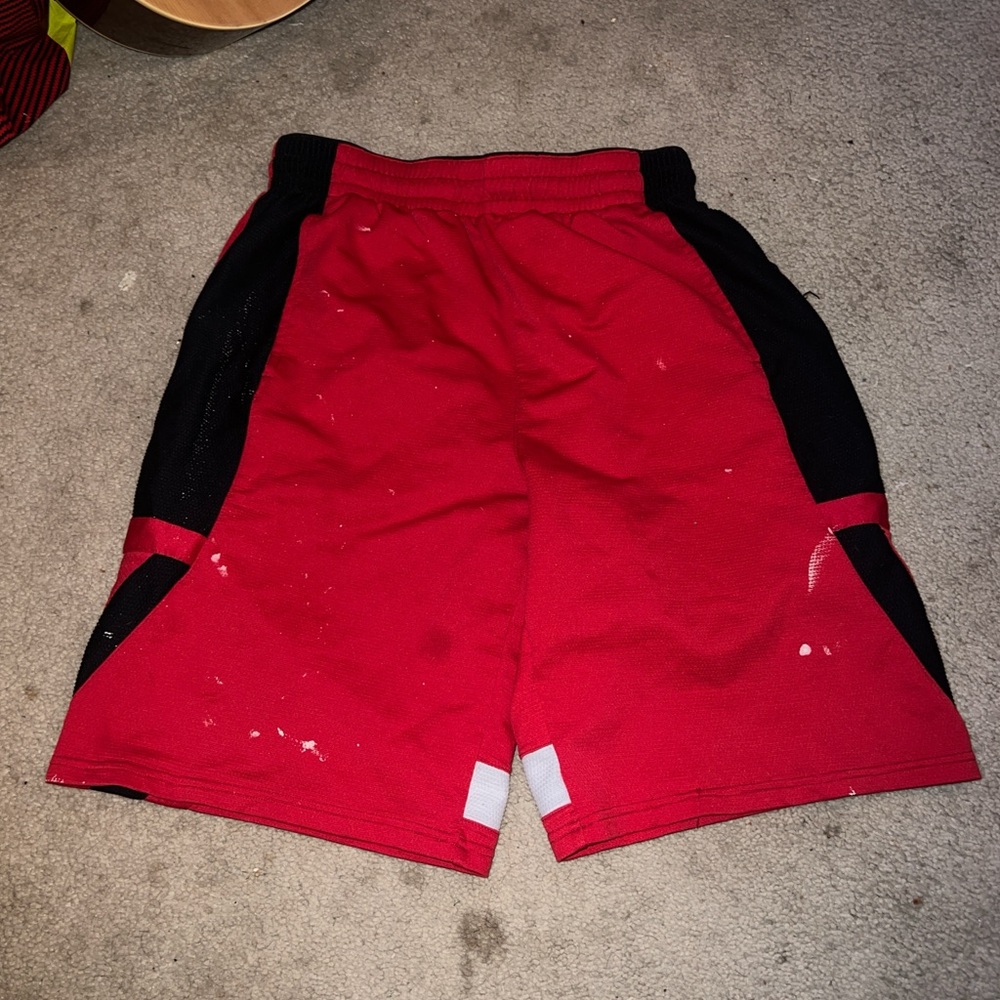 Men’s champs basketball shorts size L. White paint on front and back. Pictured.